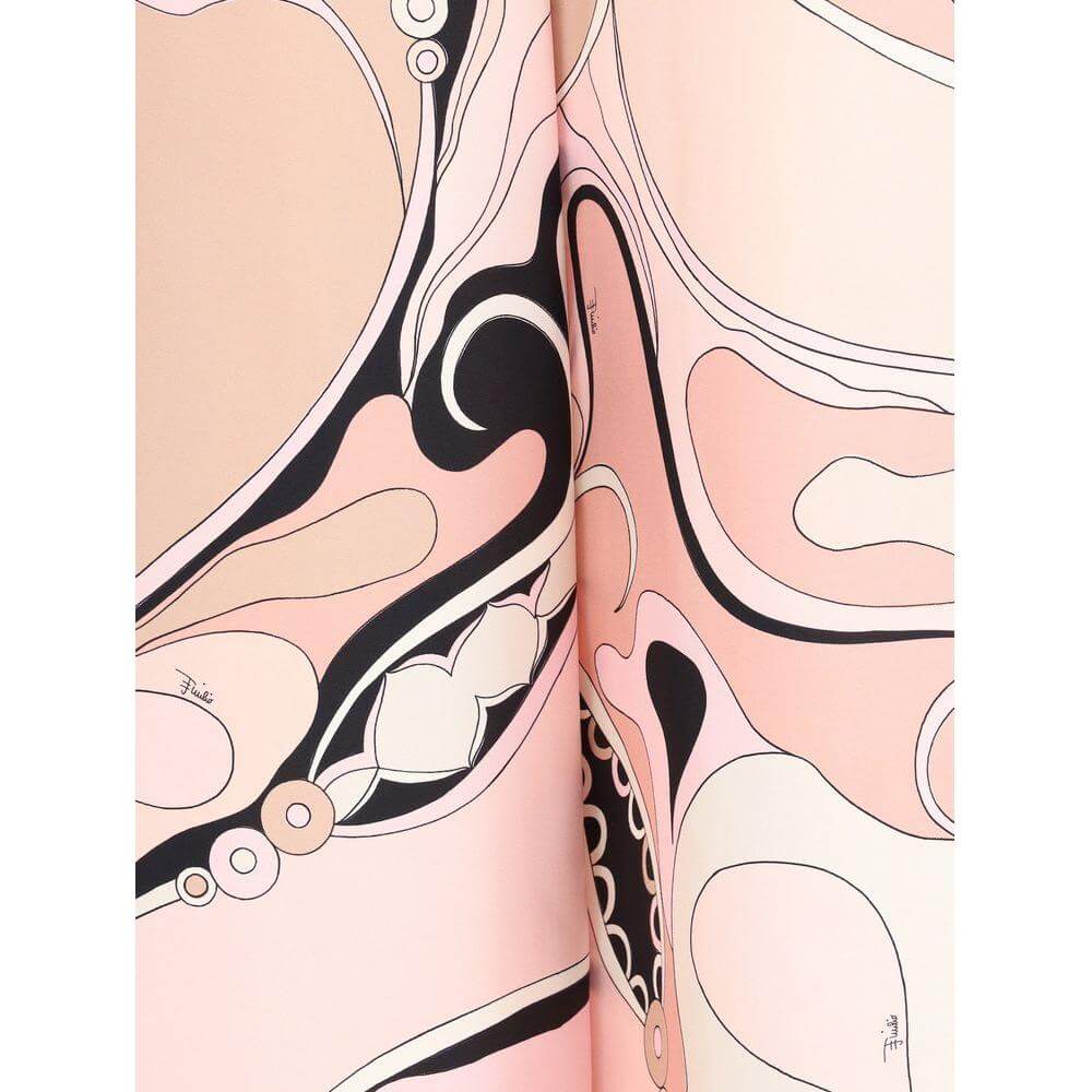 Close-up of Emilio Pucci Orchid print silk fabric in pink and black, showcasing intricate and vibrant floral patterns.