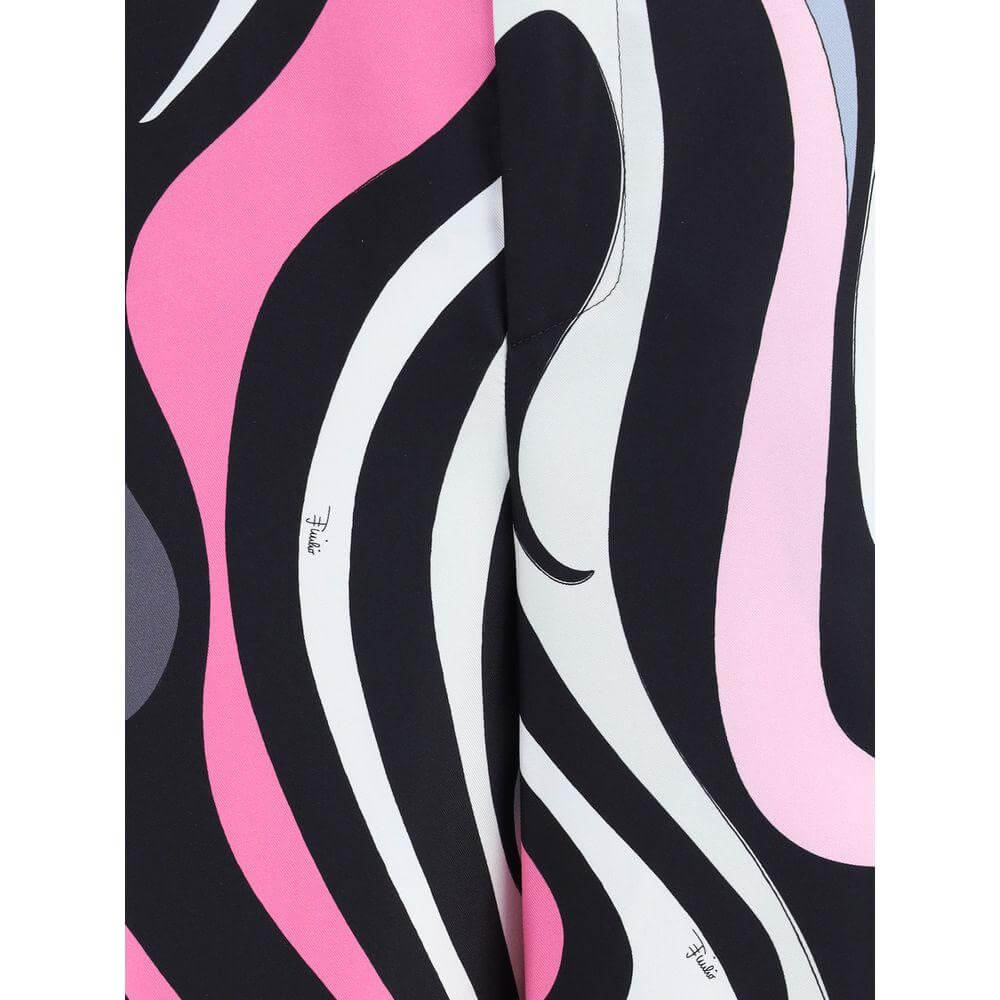 Pucci marble print silk fabric with flowing lines and vibrant colors in black, pink, and white.