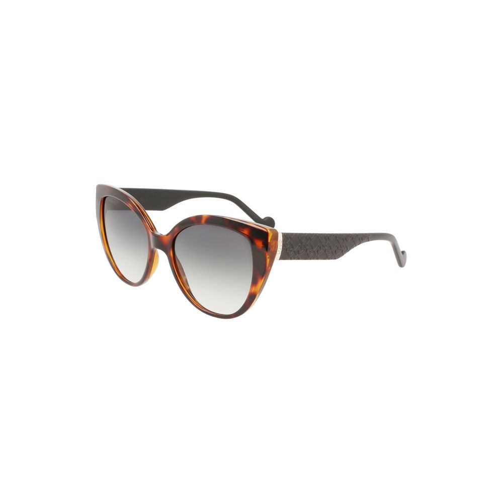 Brown cat-eye sunglasses with gradient lenses and textured temples, offering a stylish and chic accessory for women.