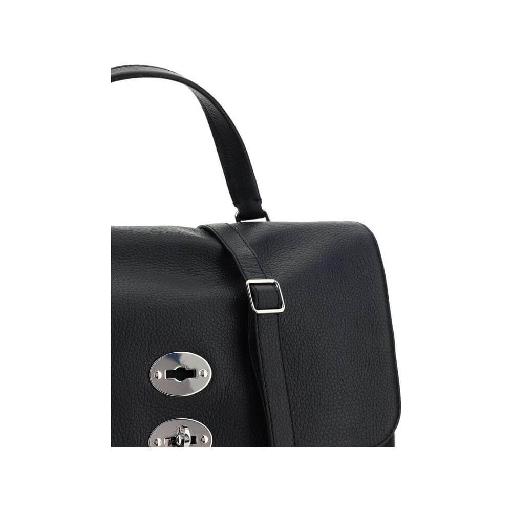 Zanellato Daily Postina Bag in calfskin with leather handle, swivel hook closure, and adjustable strap, featuring side studs.