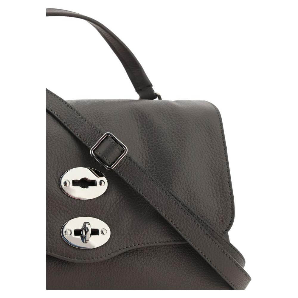 Close-up of Zanellato Postina Daily Shoulder Bag in calfskin with adjustable strap and metal closure.