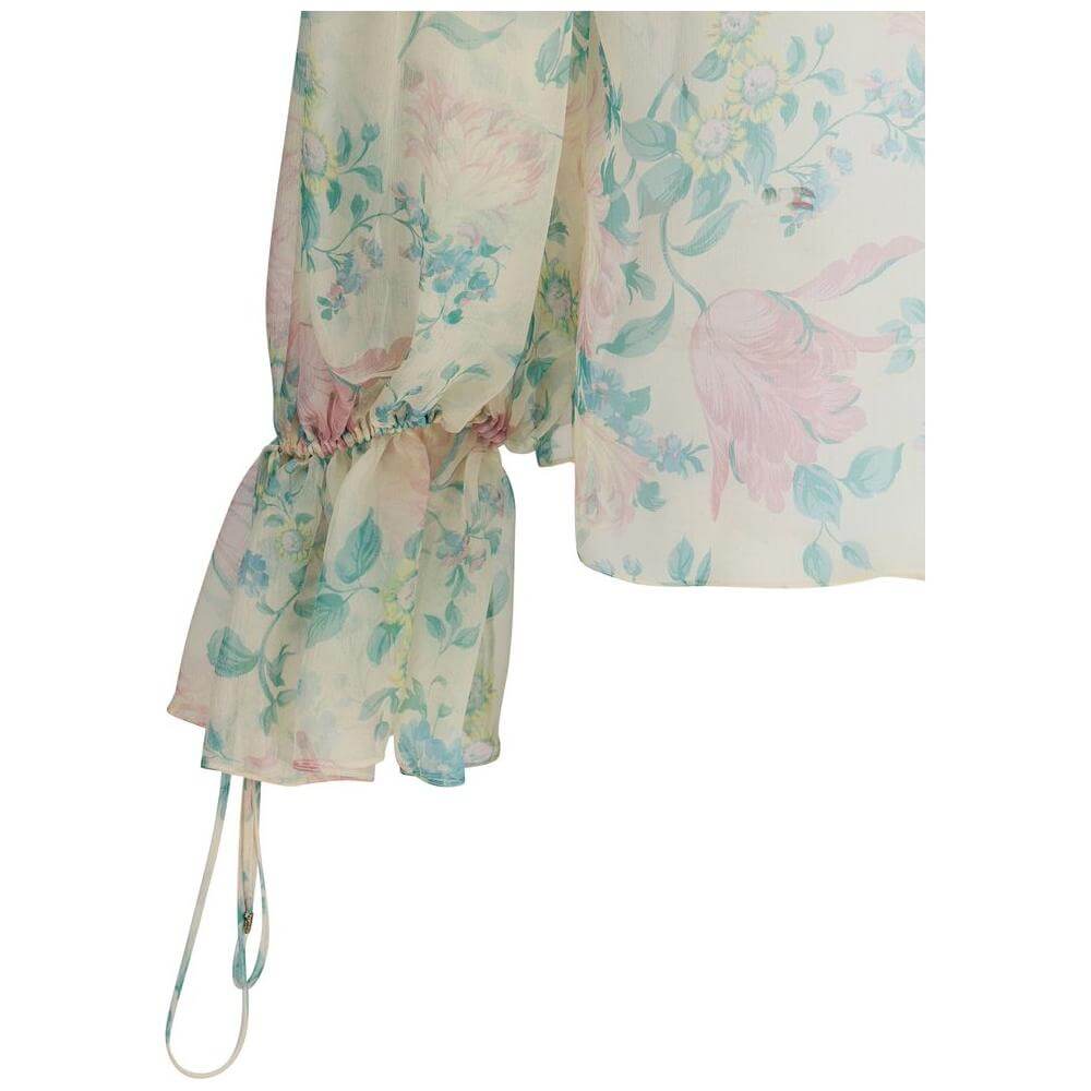 Chloé silk muslin sheer blouse with peony print, featuring mandarin collar and gathered cuffs with dangling laces, elegant fashion piece.