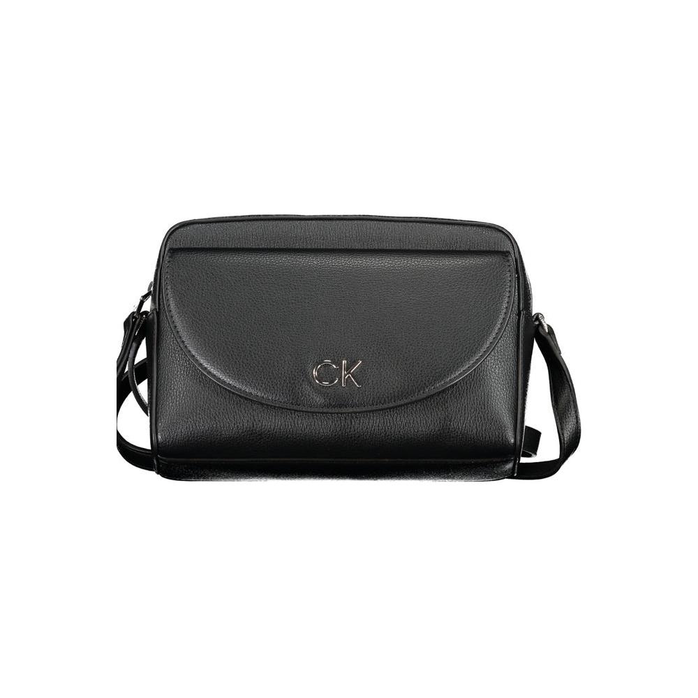 Calvin Klein black polyethylene handbag with adjustable shoulder strap, external pocket, and logo design.