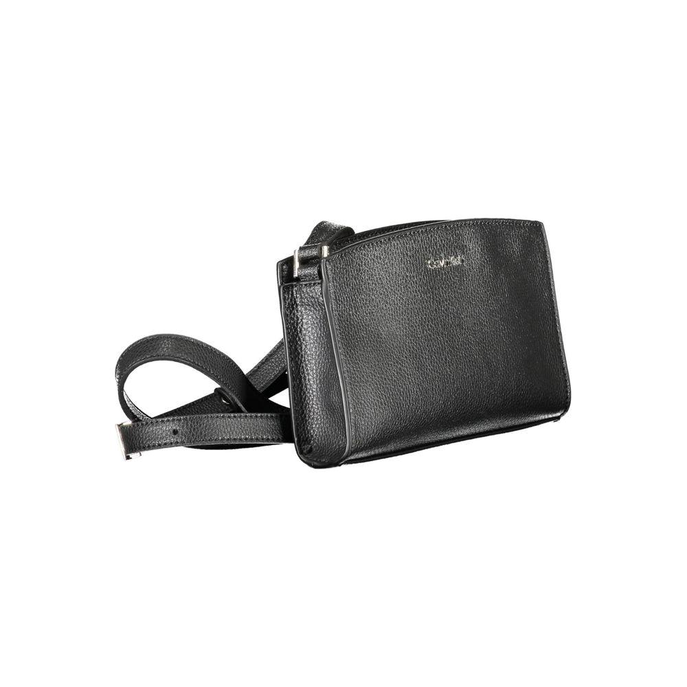 Calvin Klein black polyester women's handbag with adjustable strap and bold logo, features a zip closure and card pocket for organization.