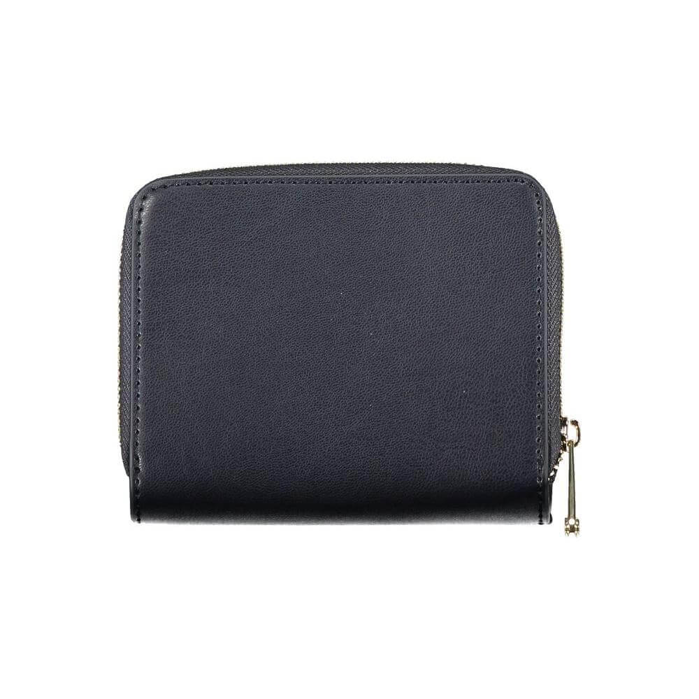 Tommy Hilfiger sleek blue wallet with zip closure, made from polyethylene. Features the iconic logo and spacious compartments.