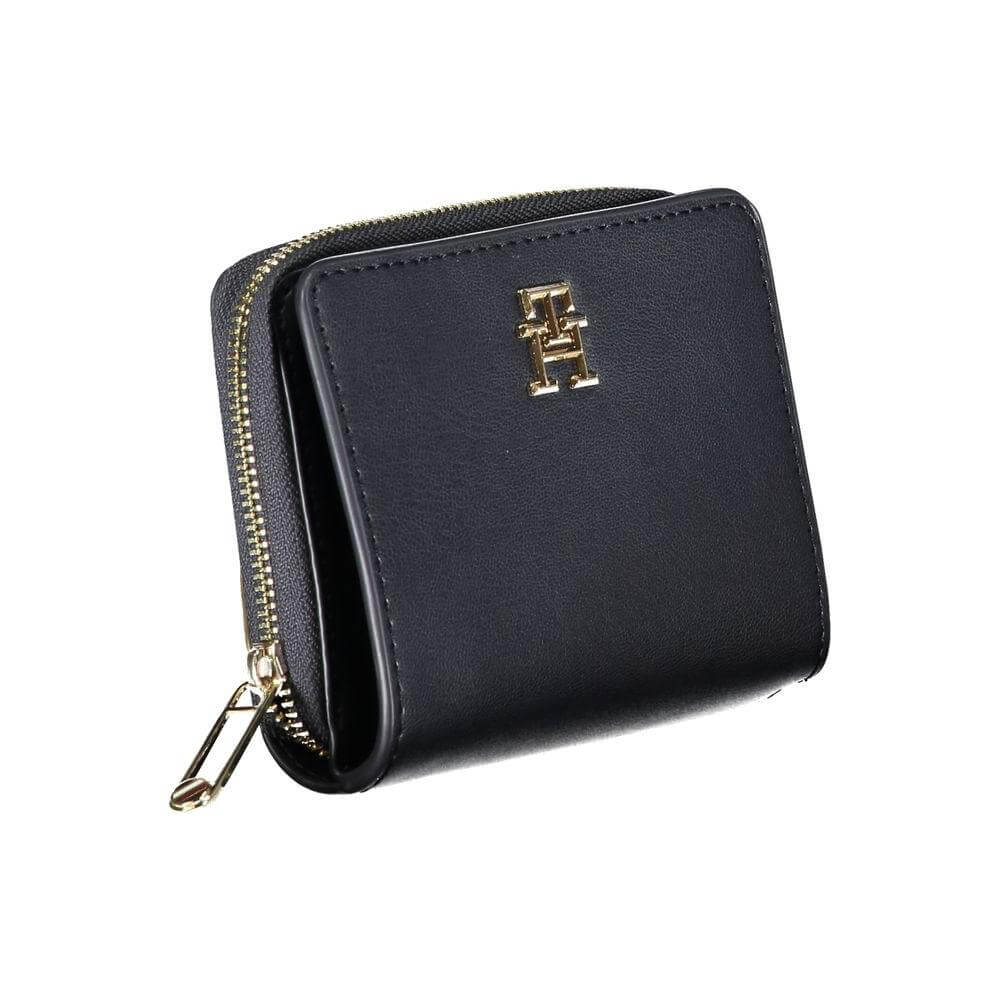 Tommy Hilfiger sleek blue polyethylene wallet with dual compartments, card spaces, coin purse, and logo, perfect for on-the-go women.