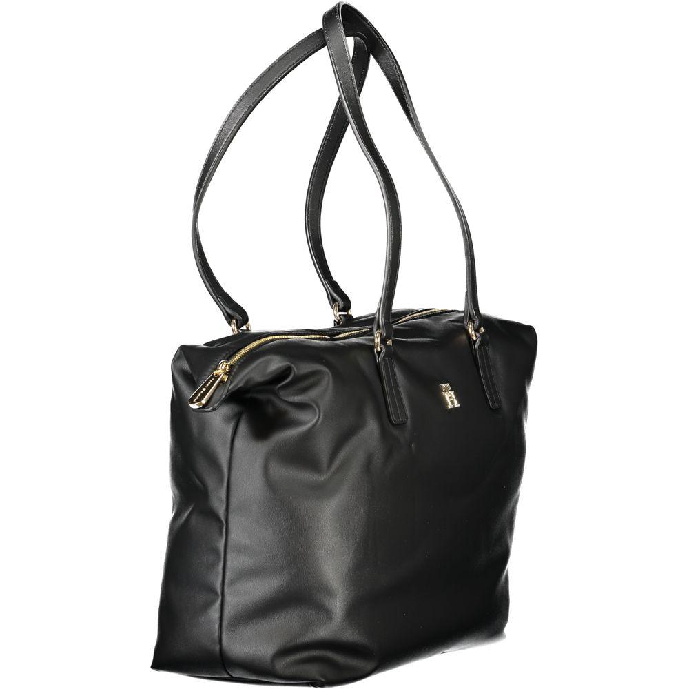 Tommy Hilfiger Black Polyester Women Handbag with dual handles, zip closure, and sleek design for modern fashionistas.