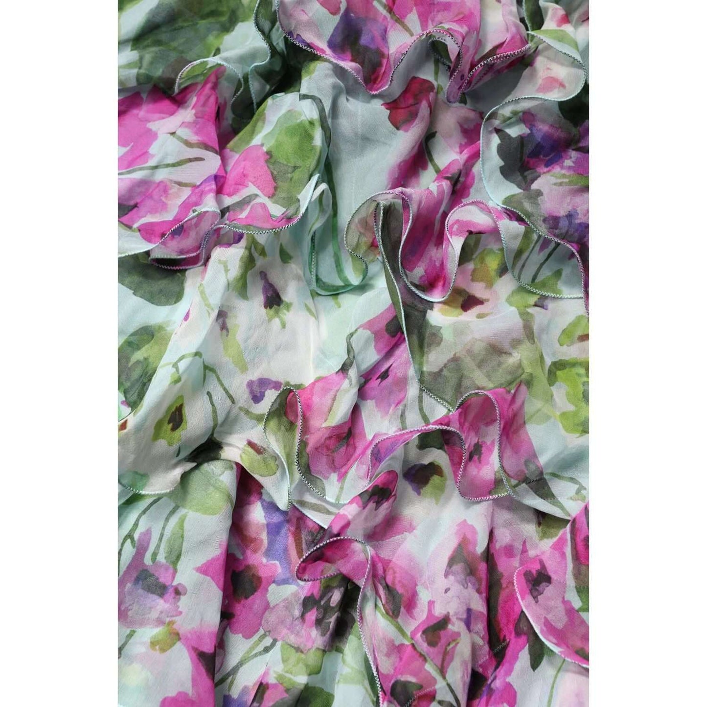 Dolce & Gabbana multicolor floral silk midi dress fabric close-up, showcasing luxurious pink, green, and white print design.