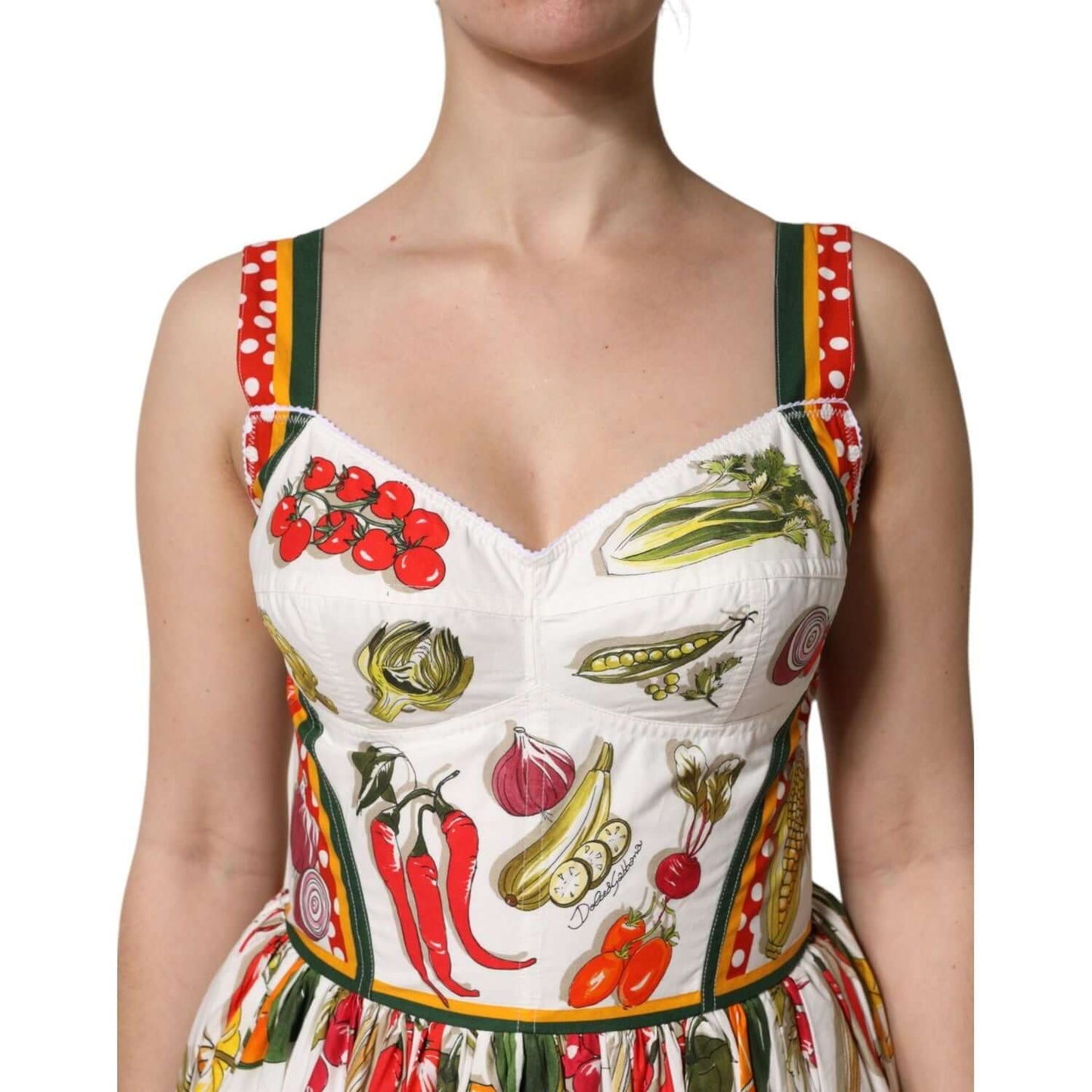Dolce & Gabbana White Vegetables Sleeveless A-line Dress featuring a colorful vegetable print and polka dot straps, 100% cotton.