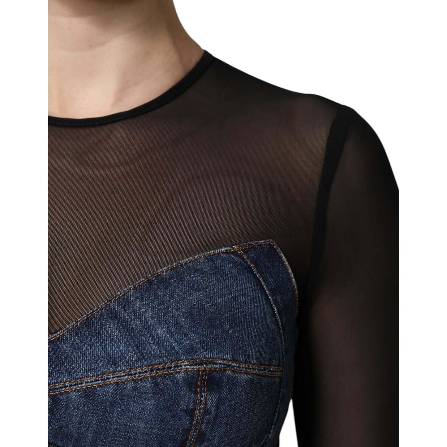 Dolce & Gabbana denim mini dress with black sheer sleeves and blue bodice, featuring elegant stitching details.
