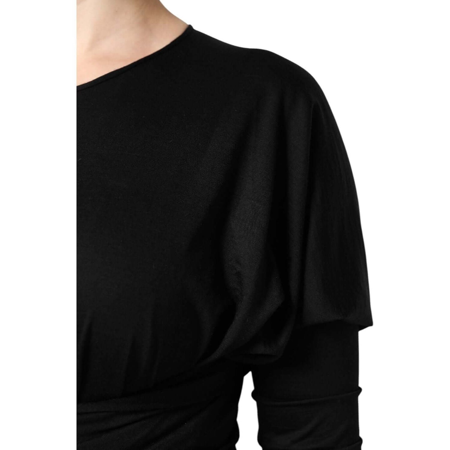 Dolce & Gabbana black wool long sleeve sheath midi dress close-up, featuring elegant craftsmanship and luxurious fabric detail.