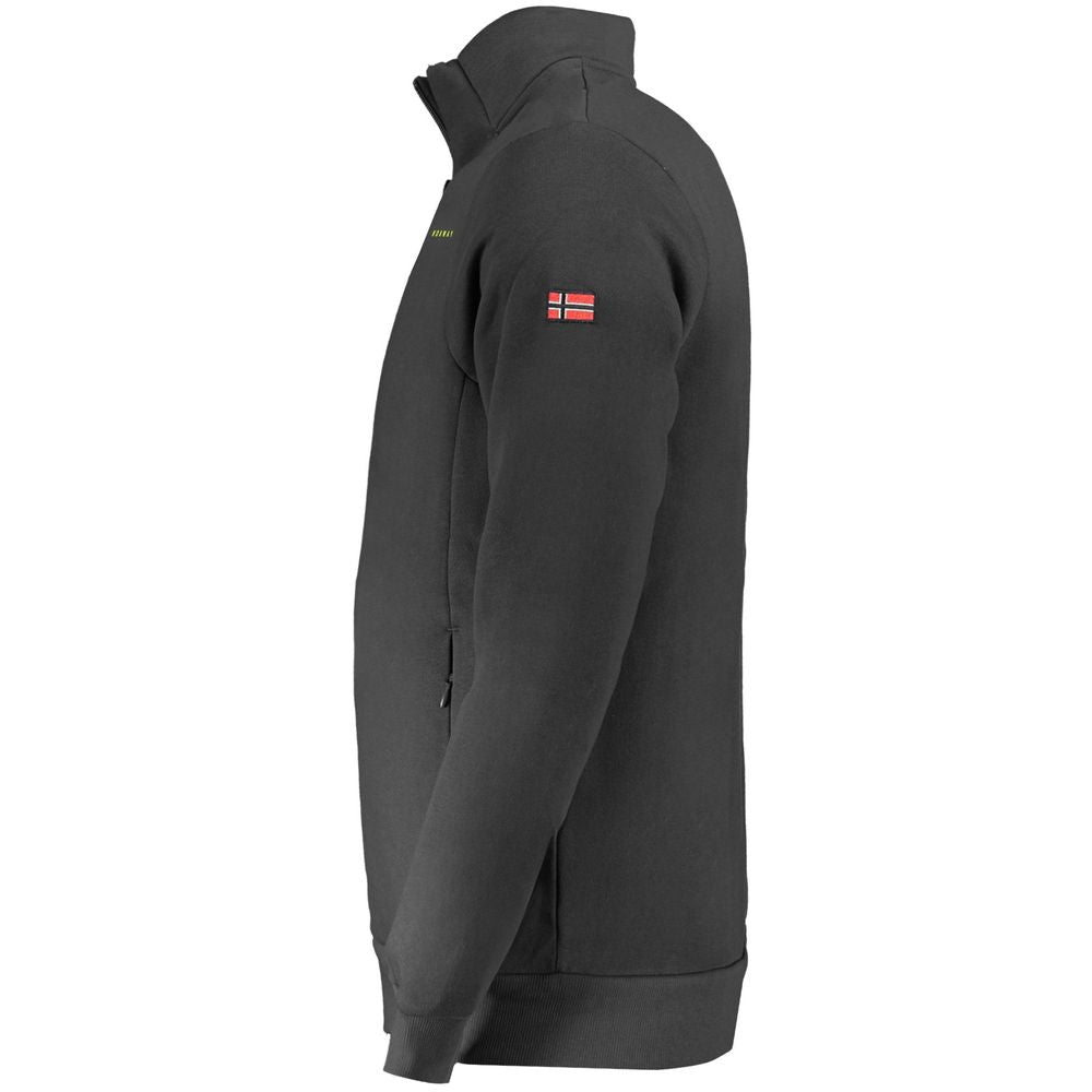 Side view of Norway 1963 black cotton men's sweater with zip pockets and Norwegian flag patch on sleeve.