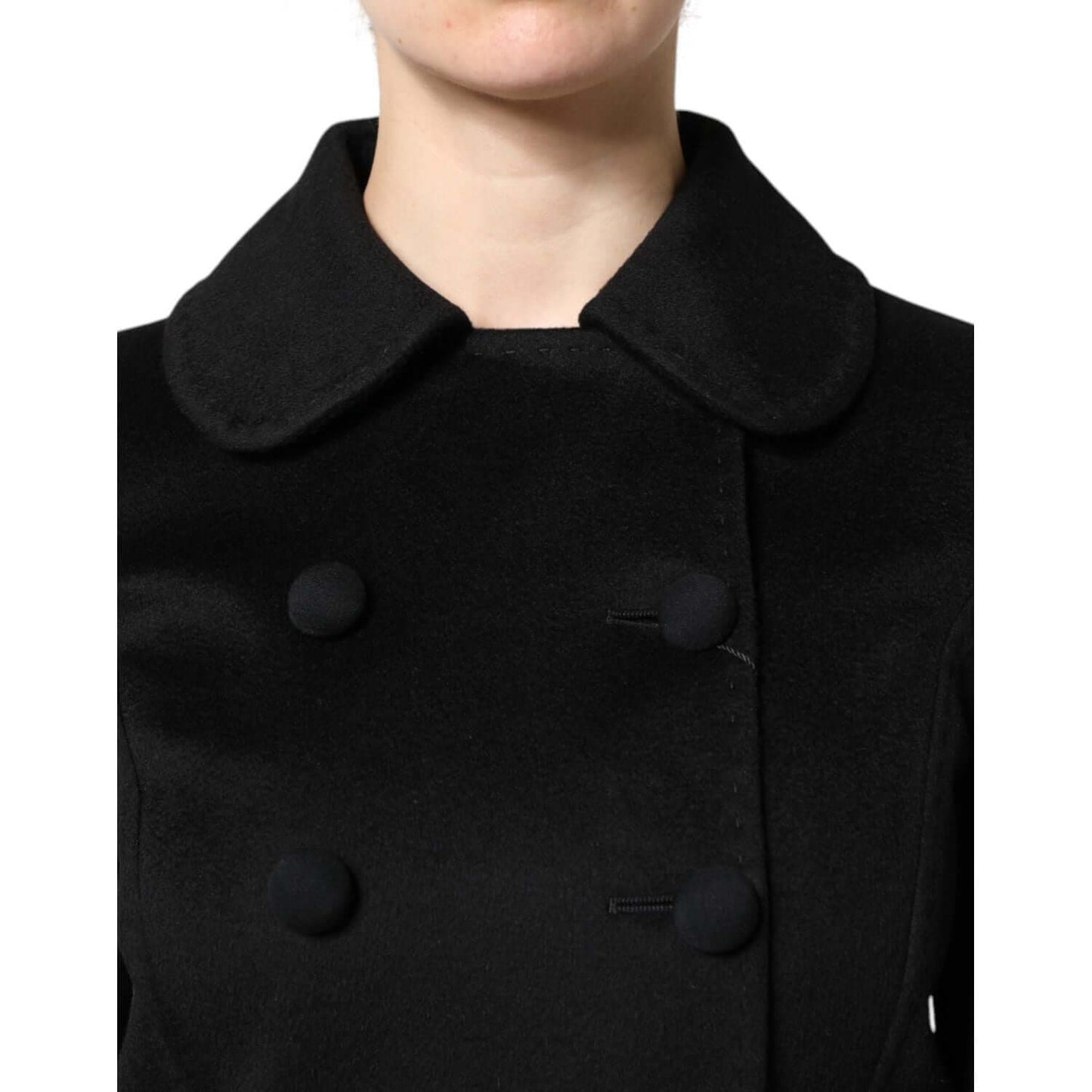 Dolce & Gabbana black wool double-breasted blazer jacket with button closure, shown in close-up view.