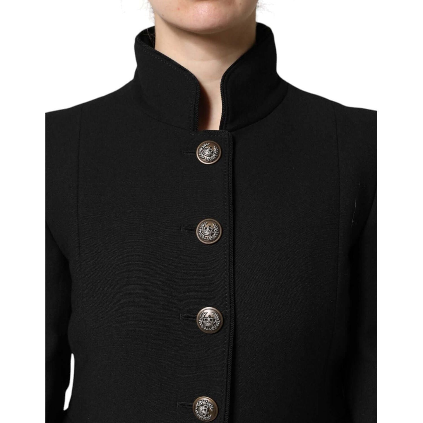 Dolce & Gabbana black wool trench coat with elegant button details, made in Italy, featuring luxurious design and craftsmanship.