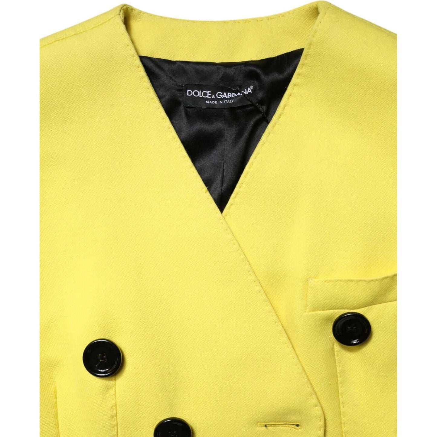 Dolce & Gabbana yellow double breasted trench coat jacket in virgin wool with button closure and logo details, made in Italy.