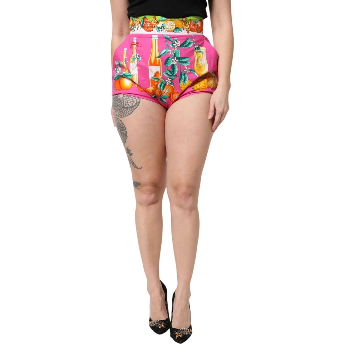Dolce & Gabbana pink high waist hot pants with vibrant fruit print, showcasing button closure and exquisite craftsmanship.