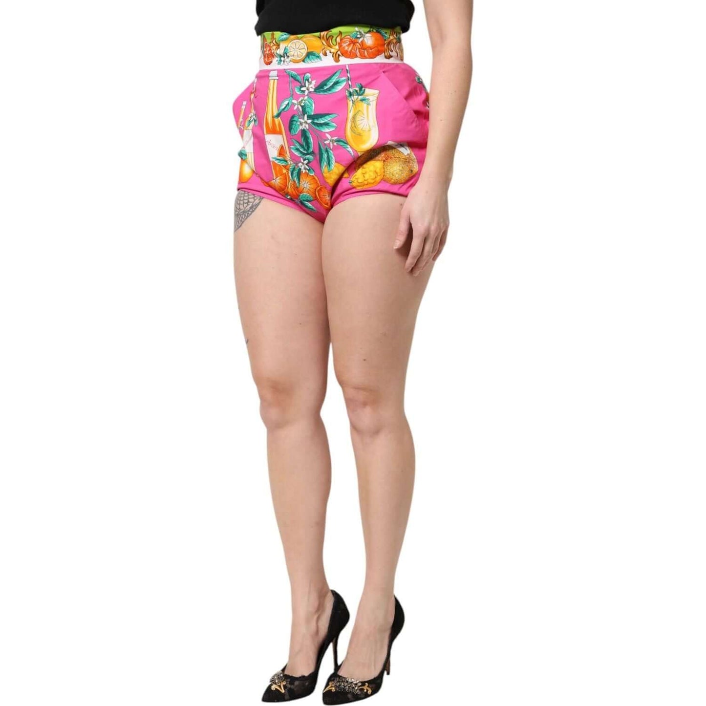 Dolce & Gabbana pink high waist hot pants with fruit print, featuring button closure and logo details, made in Italy.
