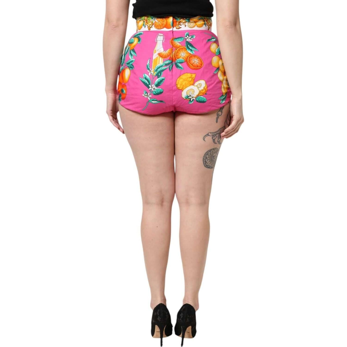 Dolce & Gabbana pink high waist hot pants shorts with fruit print, back view. Made in Italy, 100% cotton, zipper and button closure.