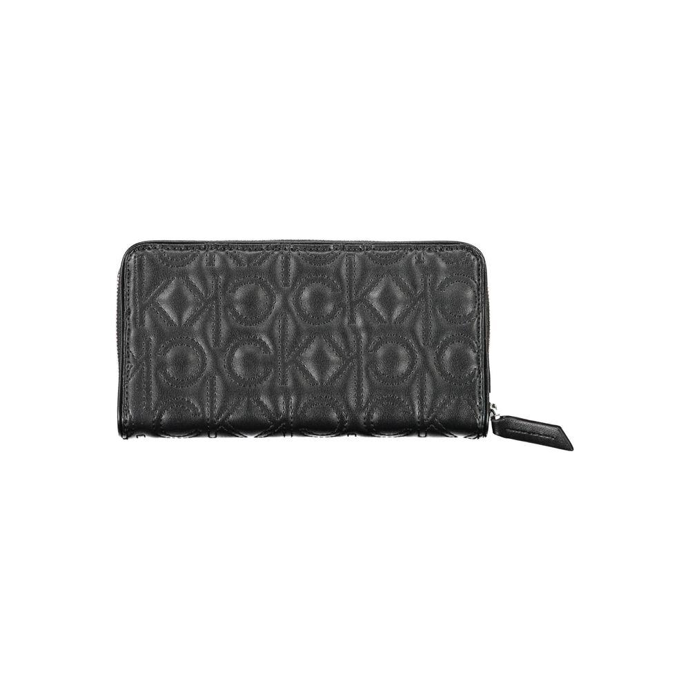 Calvin Klein black polyethylene women's wallet with zip closure and embossed design, featuring RFID lock for secure organization.