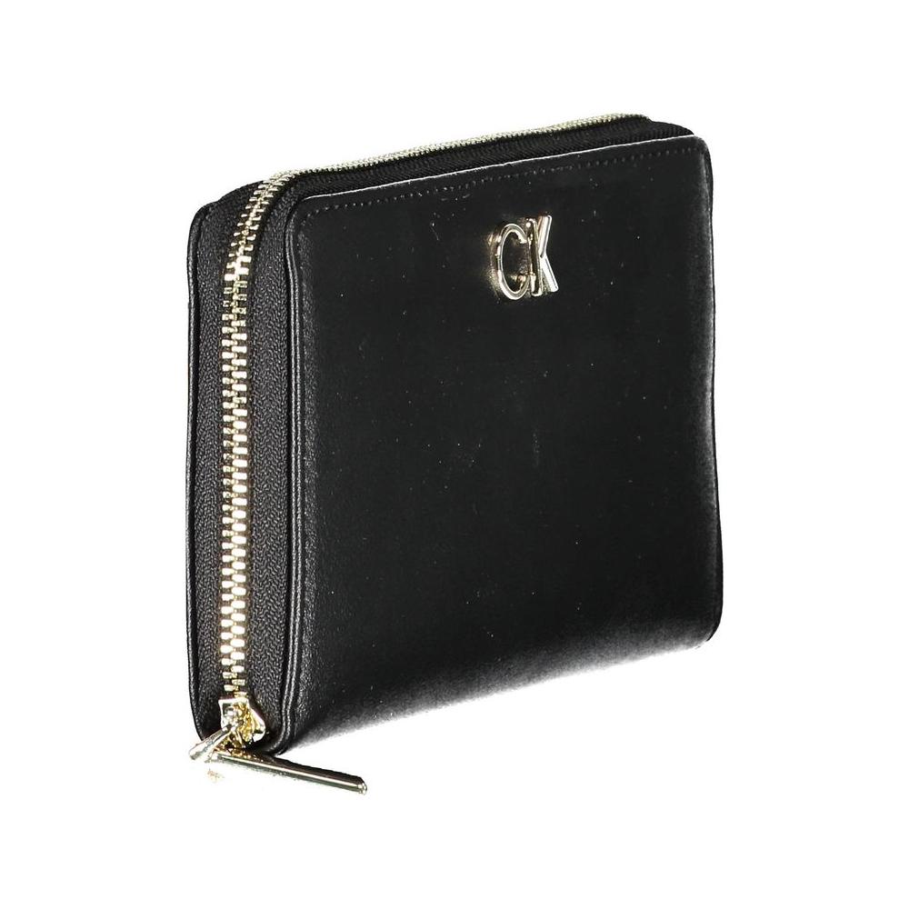 Calvin Klein black polyethylene women's wallet with zip closure and logo, featuring multiple compartments for cards and essentials.