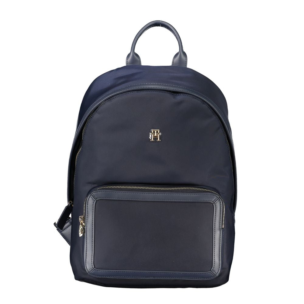 Tommy Hilfiger blue polyester backpack with single handle, adjustable straps, external pocket, zip closure, and logo.