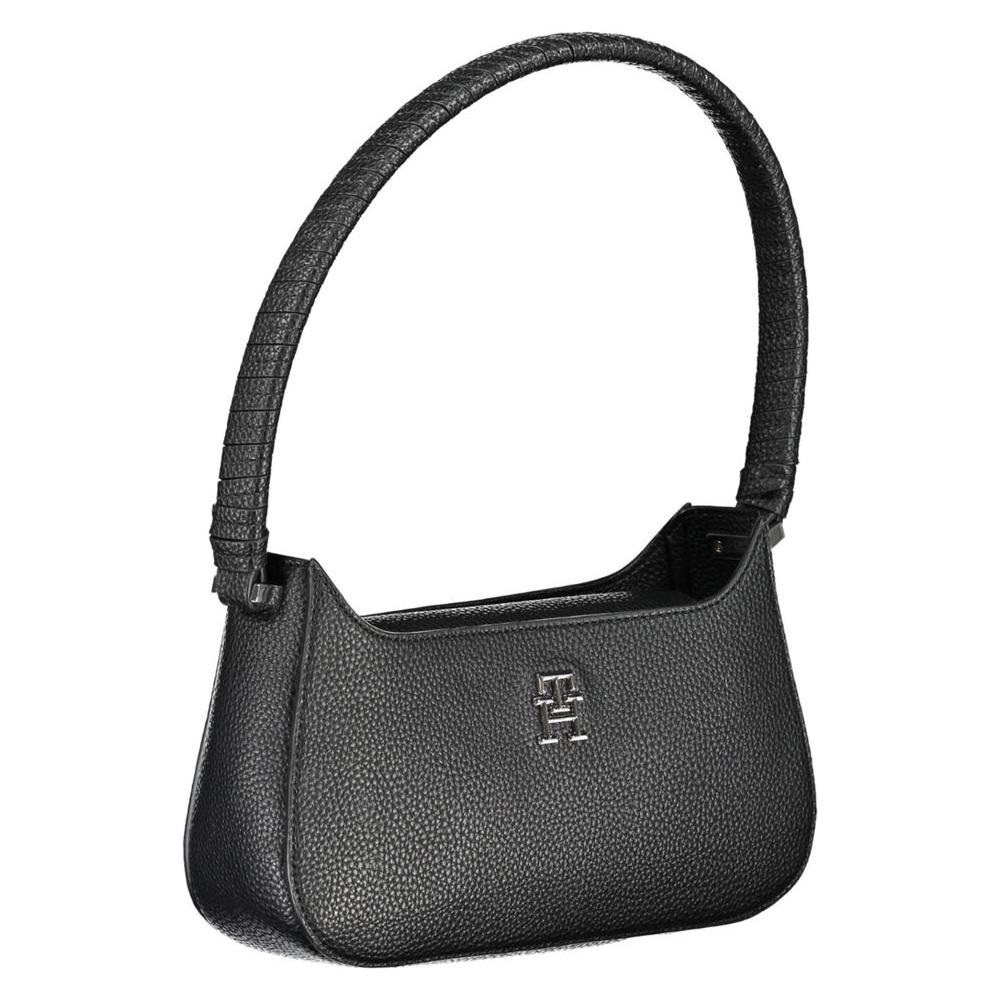 Tommy Hilfiger black polyethylene handbag with shoulder handle, magnet closure, and logo.
