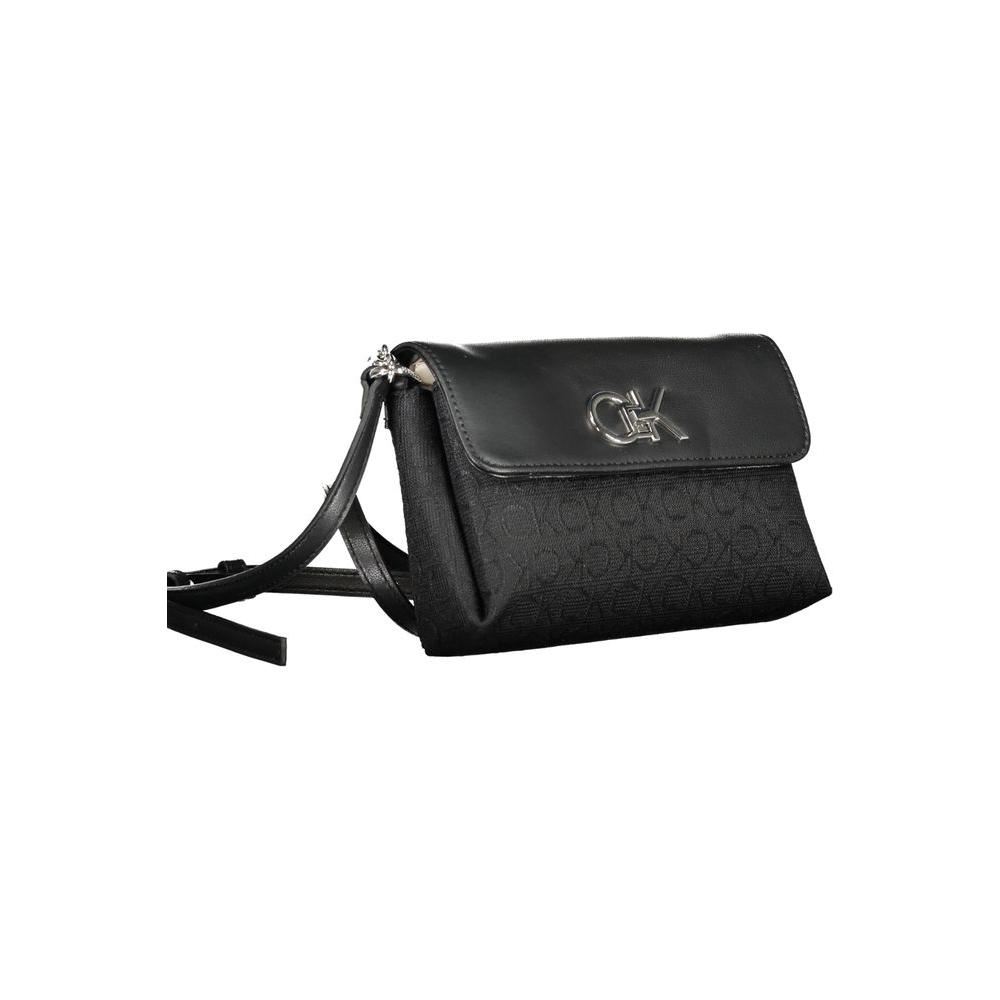 Calvin Klein black handbag with chain handle and adjustable shoulder strap, two compartments, contrast details, swivel closure, logo.