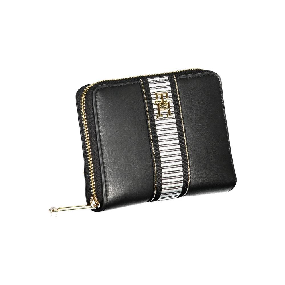 Tommy Hilfiger black polyethylene wallet with zip closure, 3 compartments, coin purse, card slots, and contrasting details