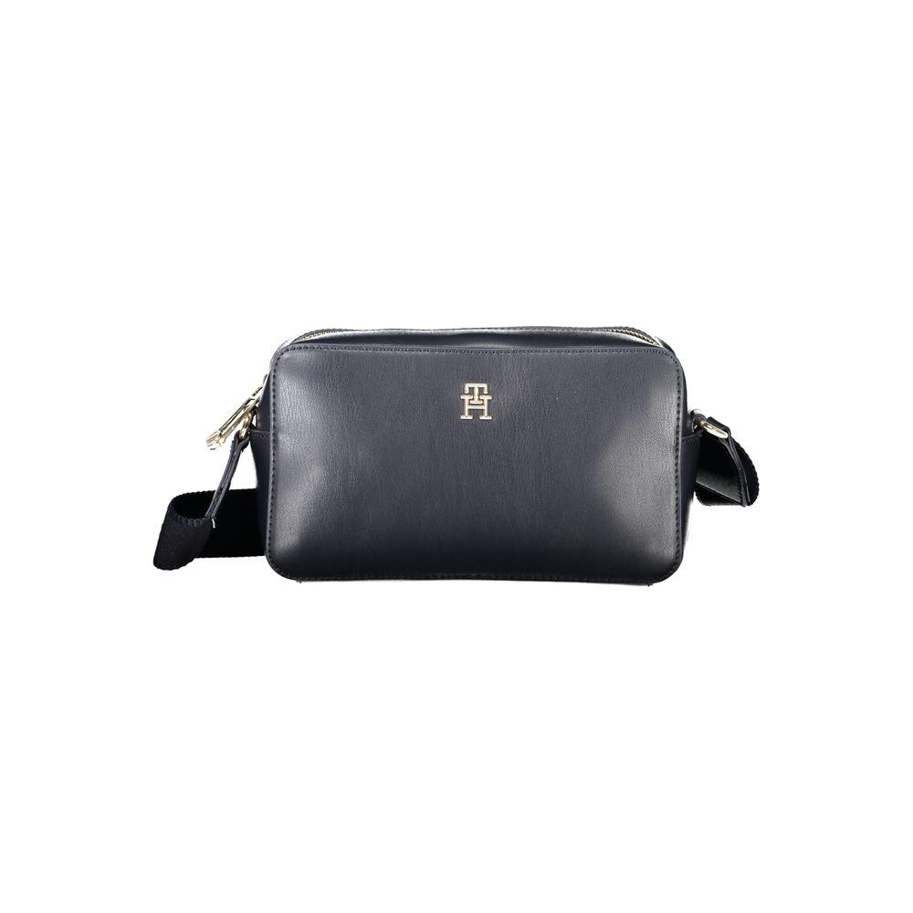 Tommy Hilfiger blue polyethylene women's handbag with logo and adjustable strap, showcasing preppy chic design and practical features.