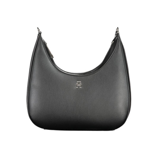 Tommy Hilfiger Black Polyester Handbag with adjustable shoulder strap, internal pocket, contrasting details, and zip closure.