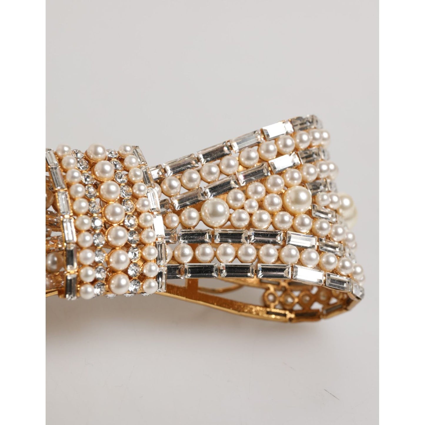 Dolce & Gabbana Gold Tone Brass Bow Crystal FauxPearl Embellished Brooch featuring pearl and crystal details on gold brass.