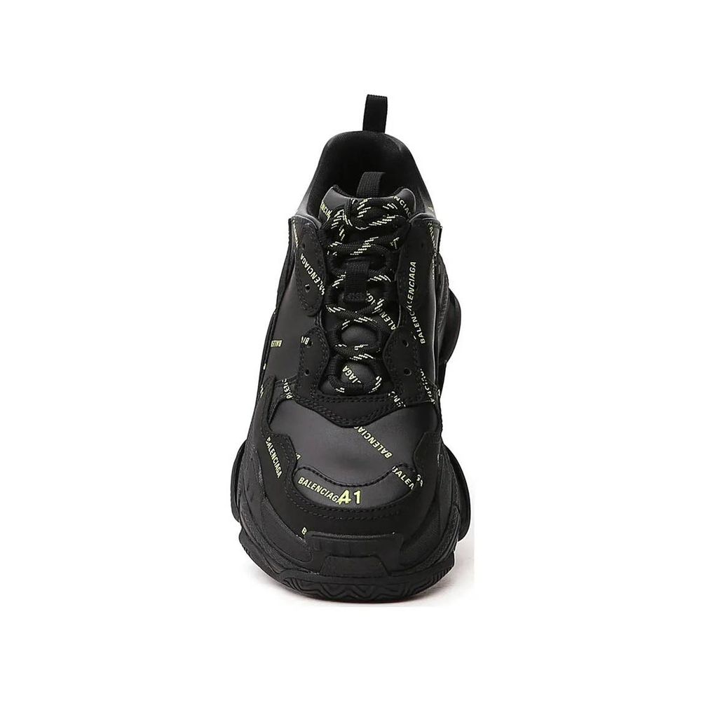 Balenciaga Black Calfskin Chunky Sneakers with logo details, round toe, and rubber sole.