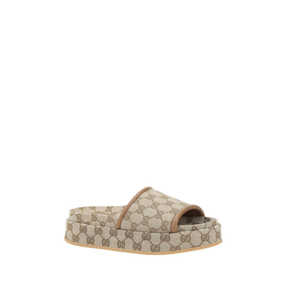 Gucci Beige Polyamide Flat Sandals with GG Supreme pattern, platform style, leather trim, modern women's accessory.