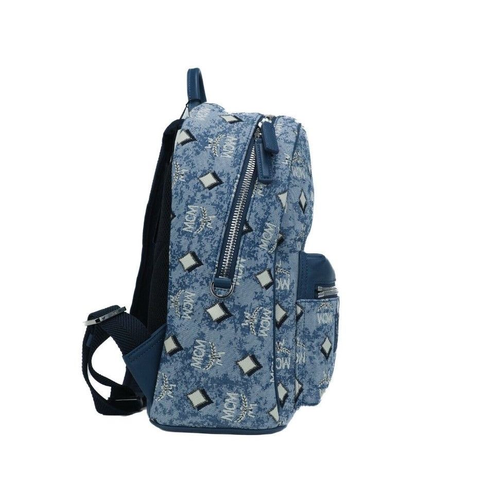 MCM Stark Small Blue Vintage Jacquard Monogram Logo Fabric Backpack Bookbag with exterior zip pocket and adjustable straps