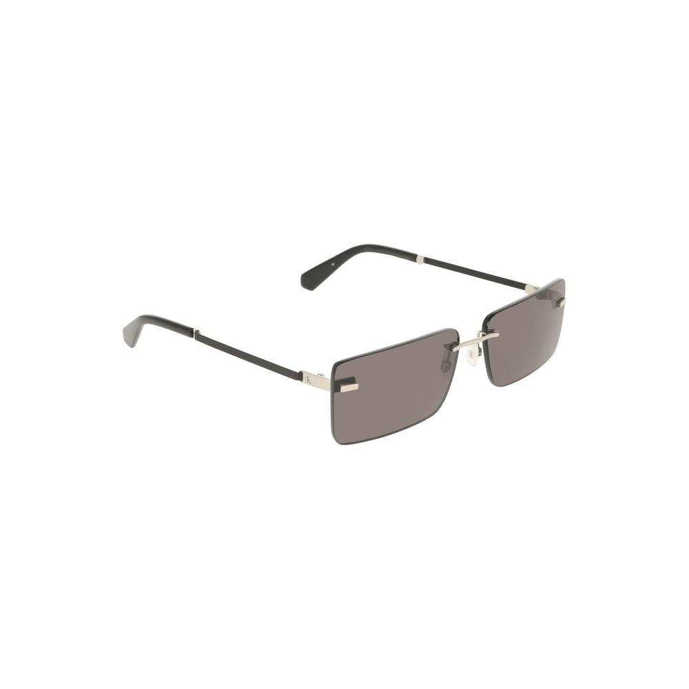 Calvin Klein black metal women's sunglasses with sleek frame and rectangular smoky tinted lenses, ideal for bold fashion statements.