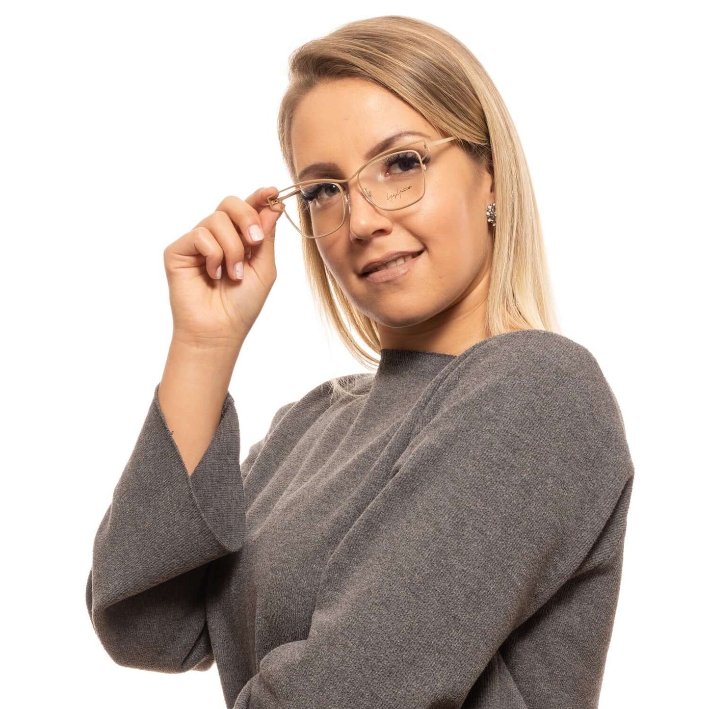 Woman wearing Yohji Yamamoto Mod. YY3019 51401 eyeglasses in gray outfit, stylish eyewear for ladies.