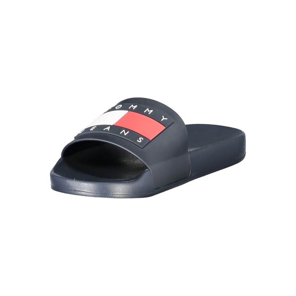 Tommy Hilfiger blue polyethylene men's sandal with iconic logo design, showcasing casual chic style for city or beach wear.