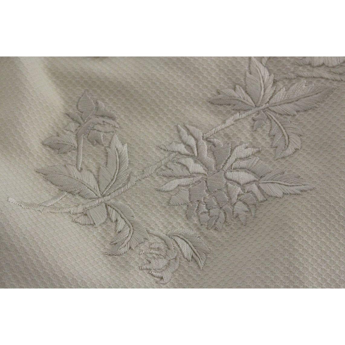 تنورة قلم رصاص أنيقة مزينة بالزهور باللون الأبيض من أندريا إنكونتري