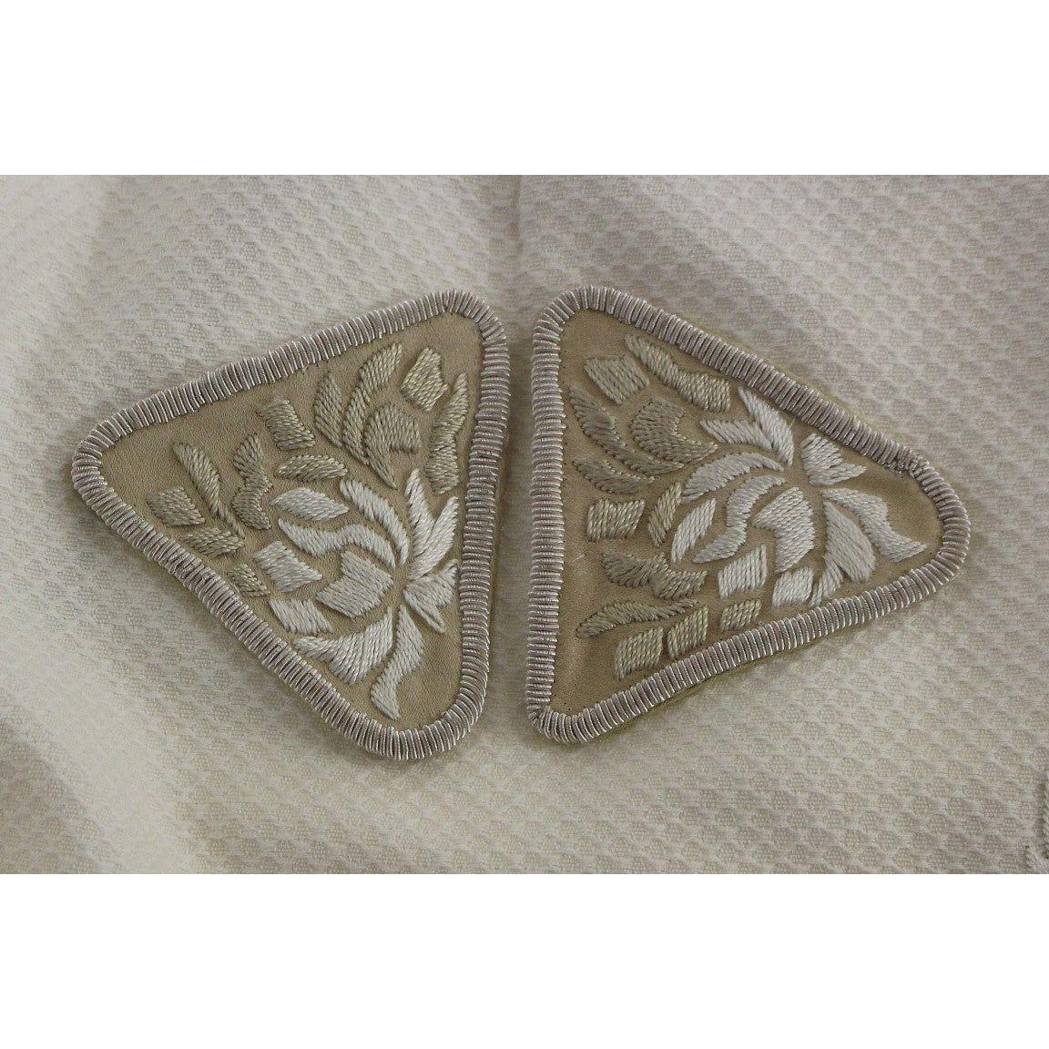 تنورة قلم رصاص أنيقة مزينة بالزهور باللون الأبيض من أندريا إنكونتري