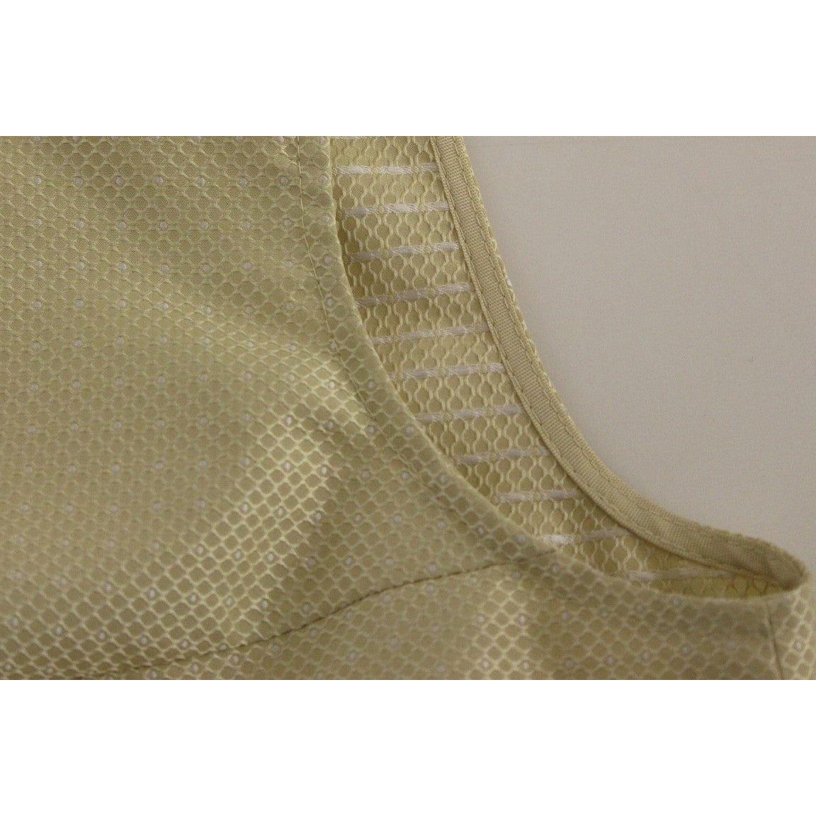 فستان أندريا إنكونتري الأنيق باللون البيج بدون أكمام