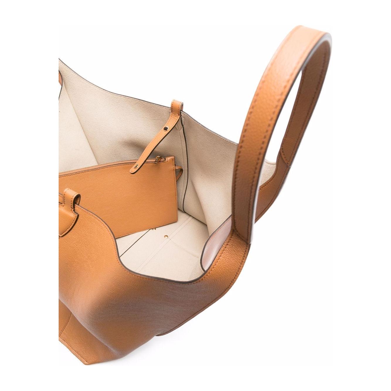 Front view with bag zipped and handles upright.