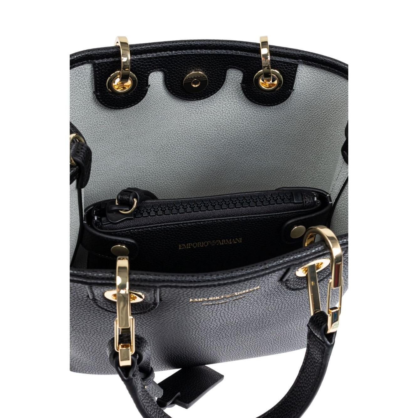 Front view with bag zipped and handles upright.