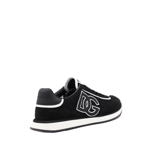 Dolce & Gabbana Sneakers Black with rubber sole and branded heel counter, showcasing DG logo on a sleek design.