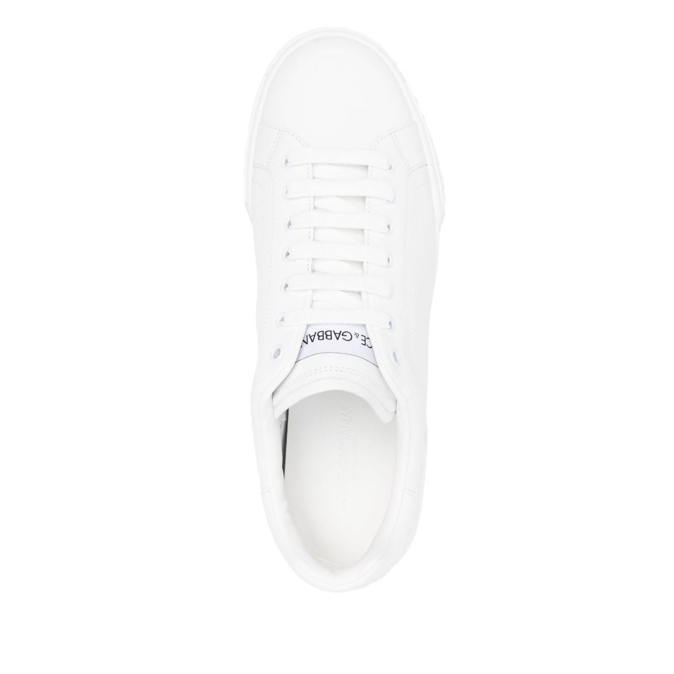 Top view of Dolce & Gabbana Sneakers White with front lace-up, round toe, logo patch on tongue, and flat rubber sole in leather.