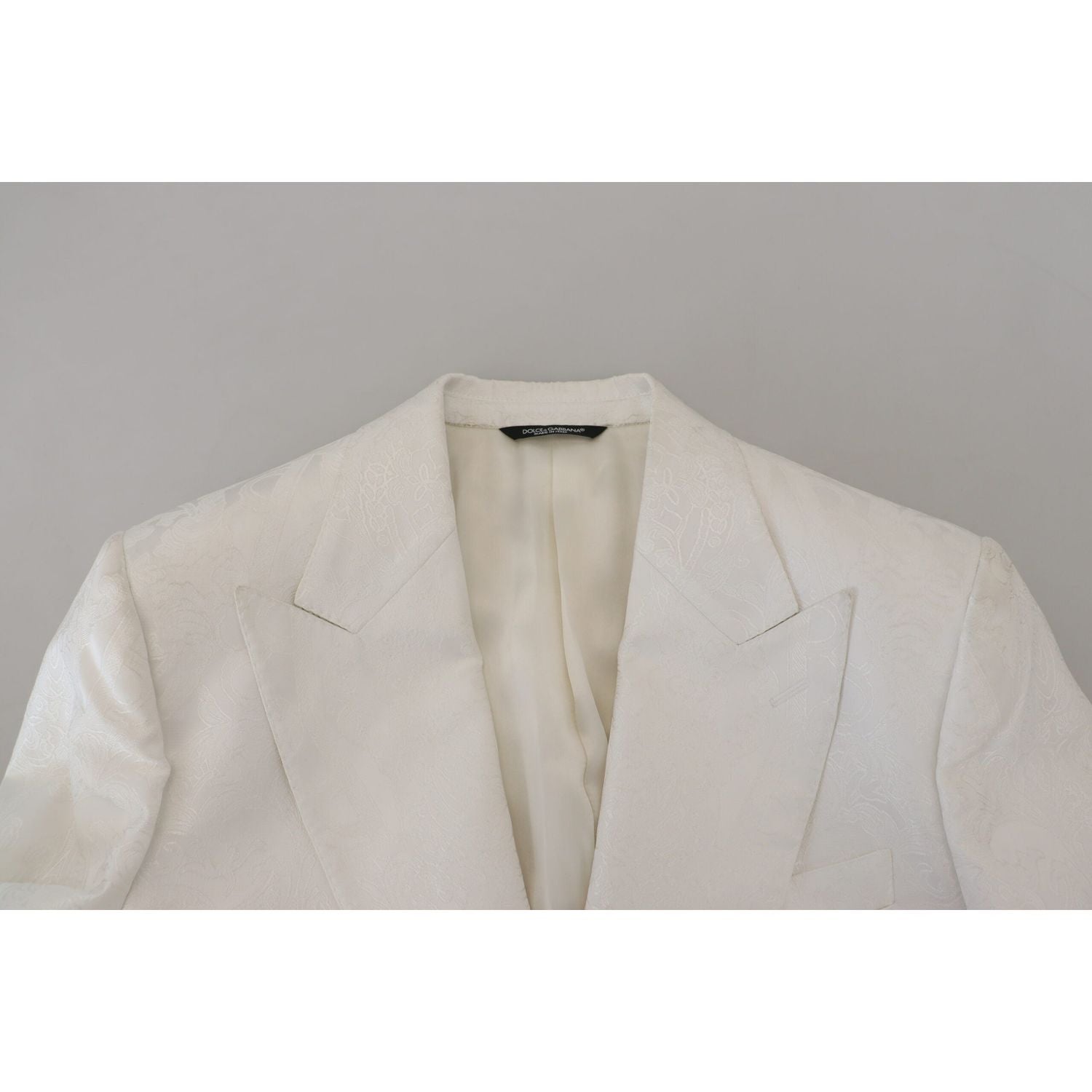 معطف ترنش أنيق من دولتشي آند غابانا مزين بالزهور باللون الأبيض