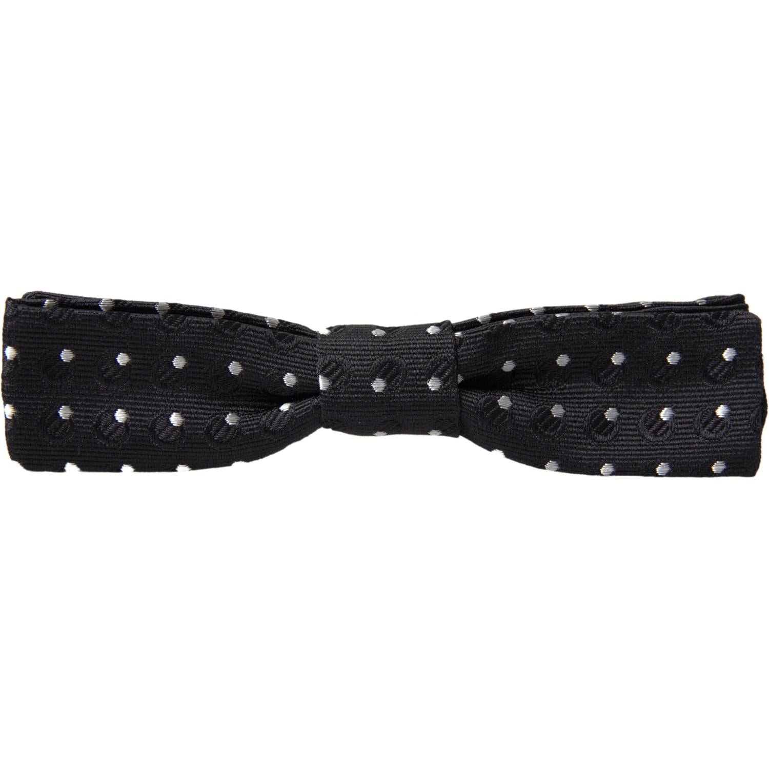 ربطة عنق أنيقة من الحرير الأسود من دولتشي آند غابانا مع مشبك مميز