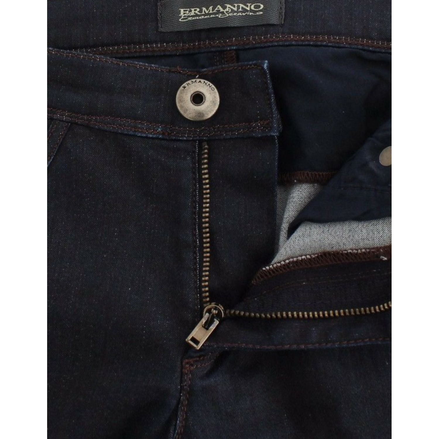 بنطلون جينز ضيق باللون الأزرق الداكن من Ermanno Scervino لإطلالة أنيقة