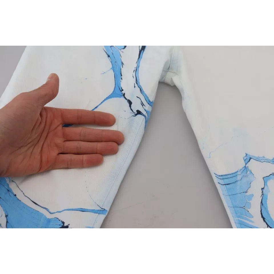 بنطلون جينز ضيق من القطن باللون الأبيض والأزرق من دولتشي آند غابانا