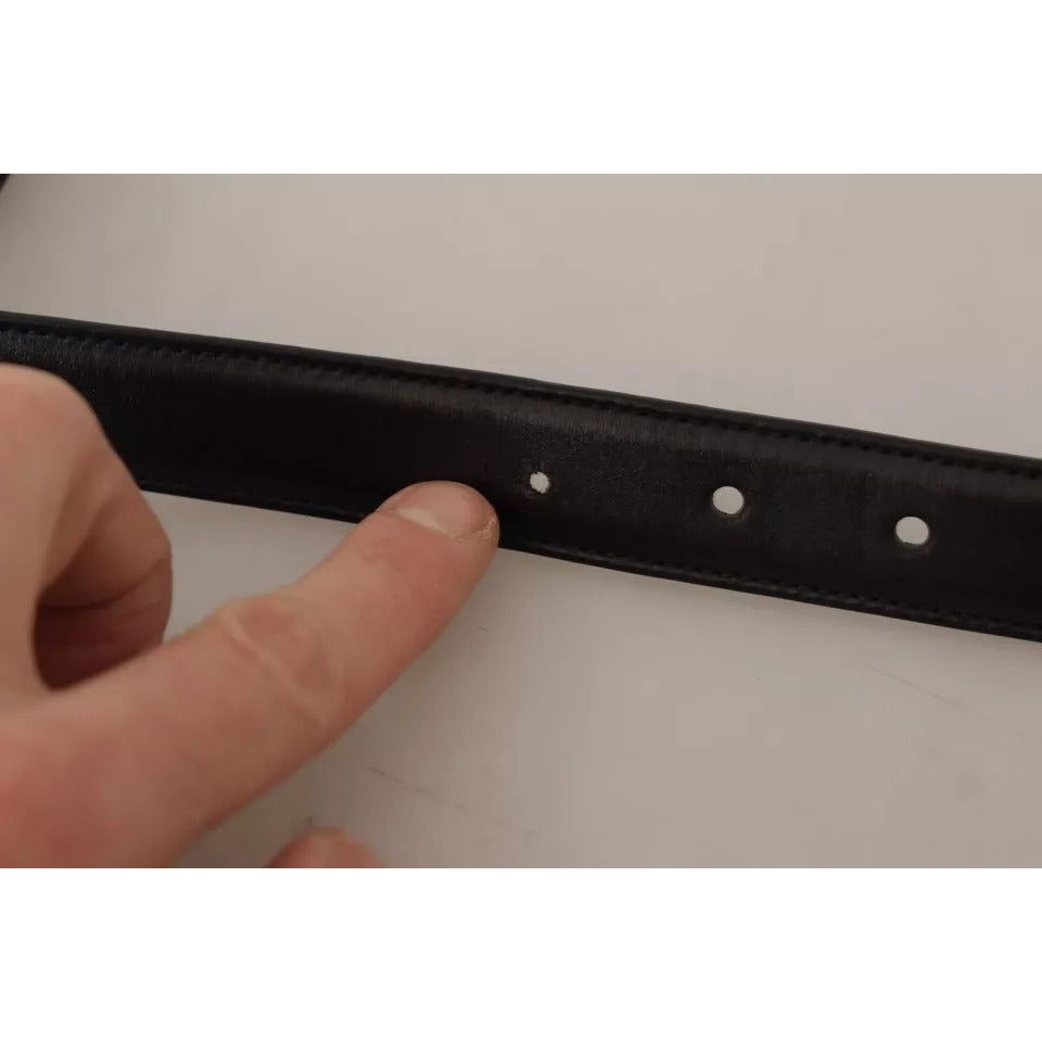 حزام دولتشي آند غابانا المصنوع من جلد العجل الأسود ومشبك معدني بشعار قديم