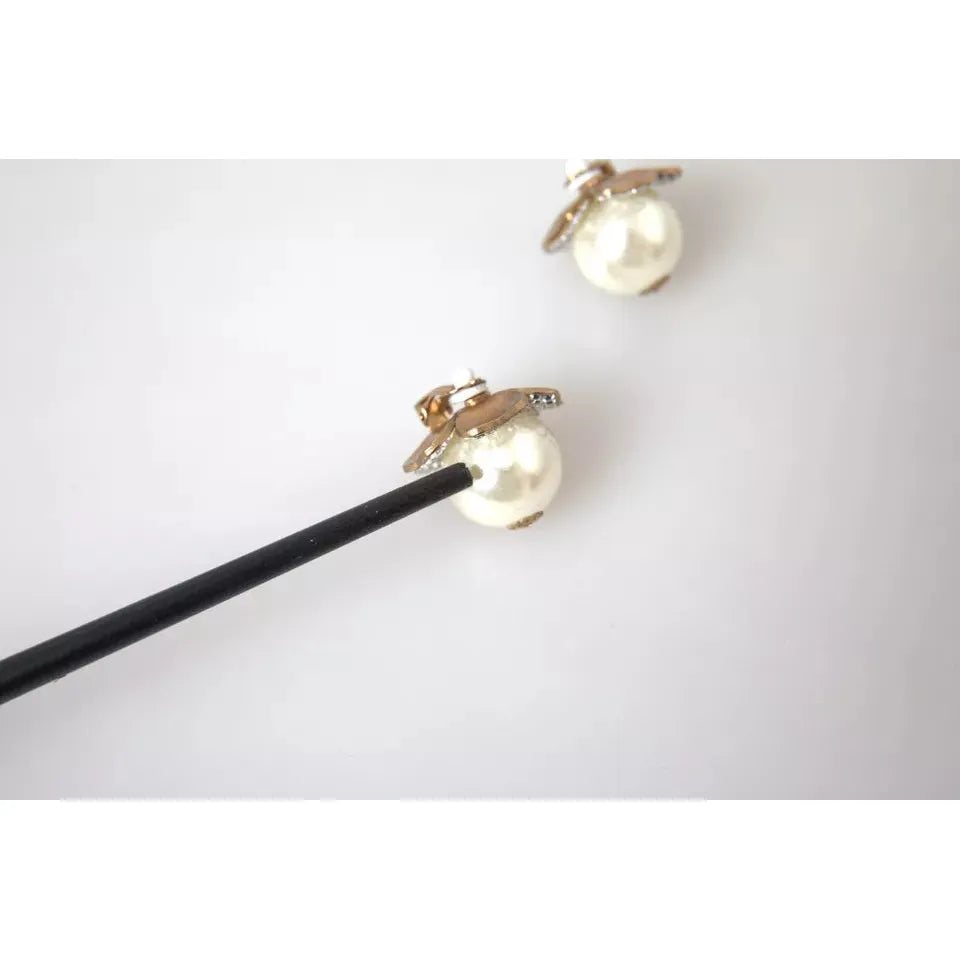 أقراط دولتشي آند غابانا الذهبية ذات اللون الذهبي بتصميم زهور اللؤلؤ الصناعي